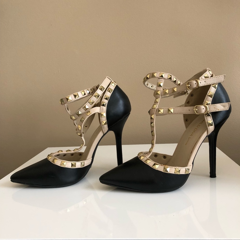 Black and beige studded heels.